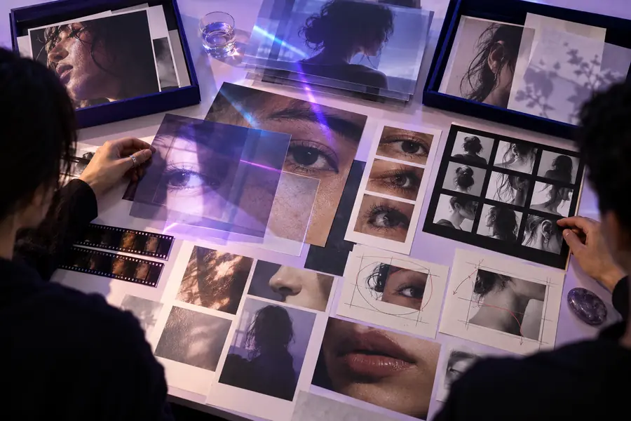 Creative workspace showing face-focused visual material